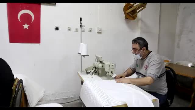 Tanıtım filmindeki istiflenmiş tekstil ürünleri